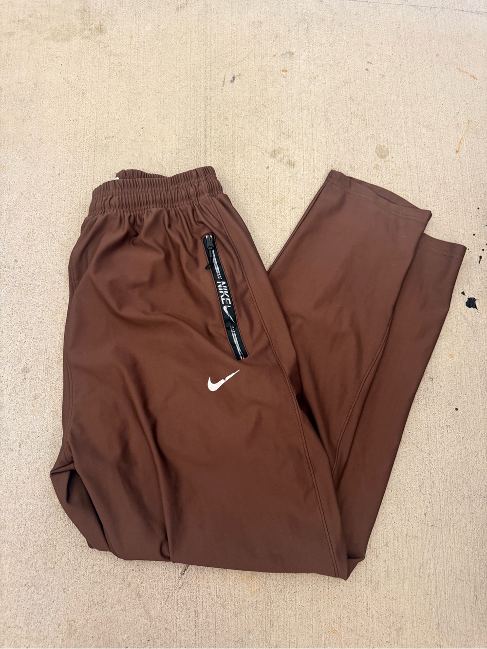 Nike Brown Athletic Track Pants with White Swoosh